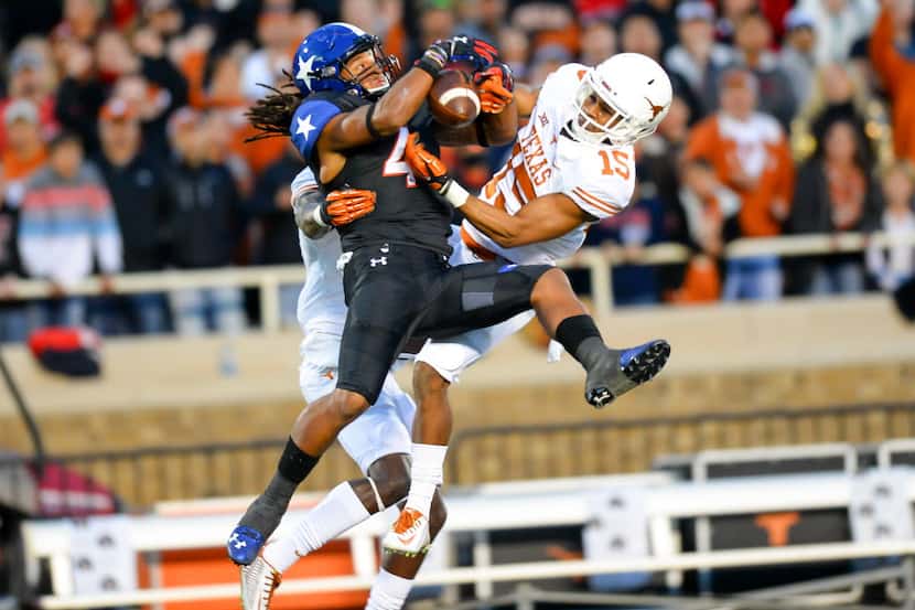 Bradley Marquez (4) of the Texas Tech Red Raiders tries to make the catch while being...