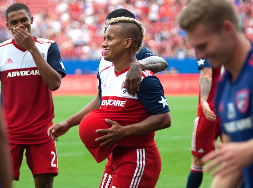 FC Dallas midfielder Michael Barrios (21) celebrates scoring a goal by putting the soccer...