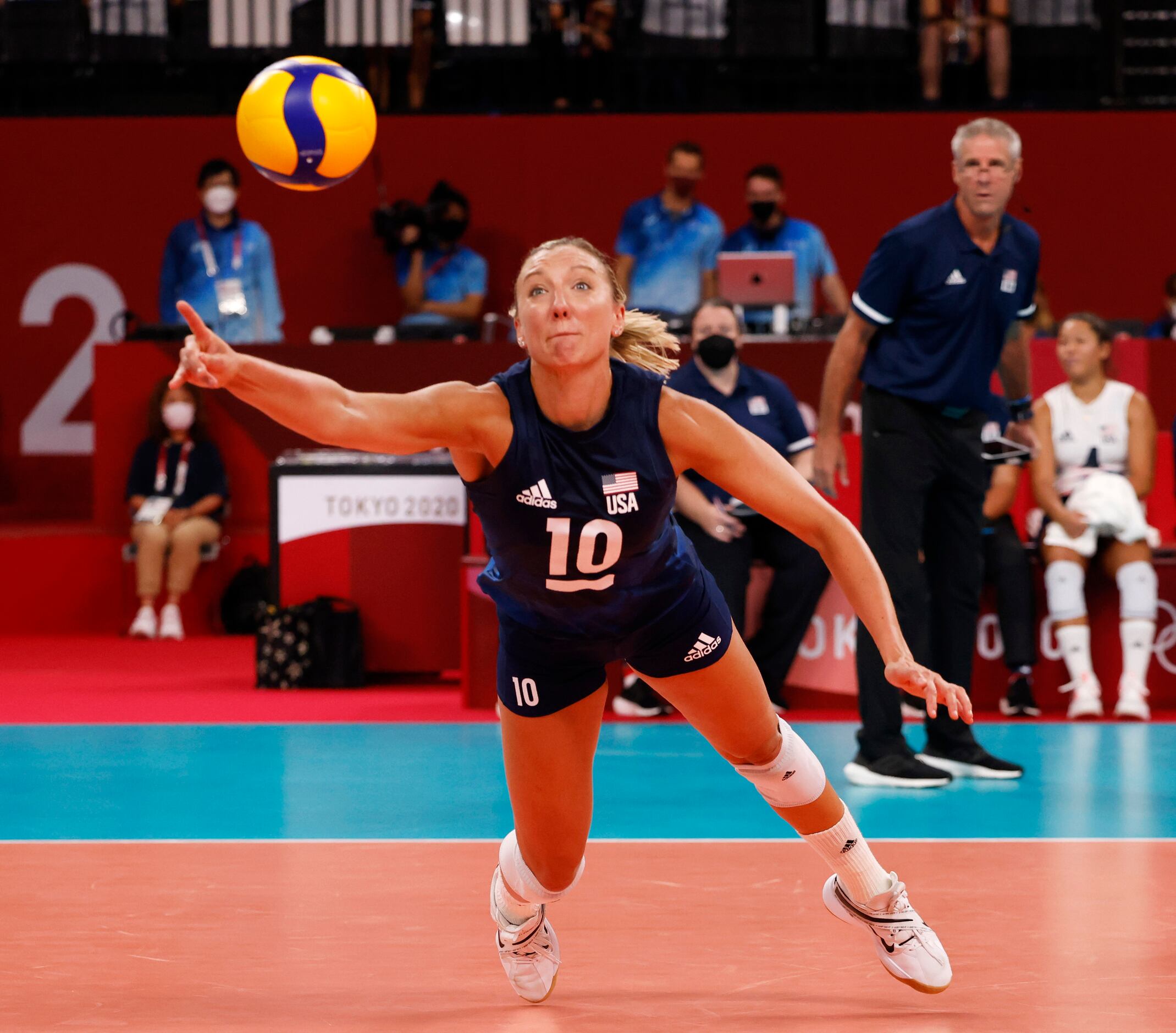 USA’s Jordan Larson (10) dives for the ball in a game against the Dominican Republic during...