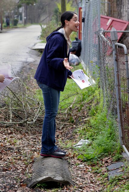 Houston City Council member Amanda Edwards talks with a resident affected by the floods of...