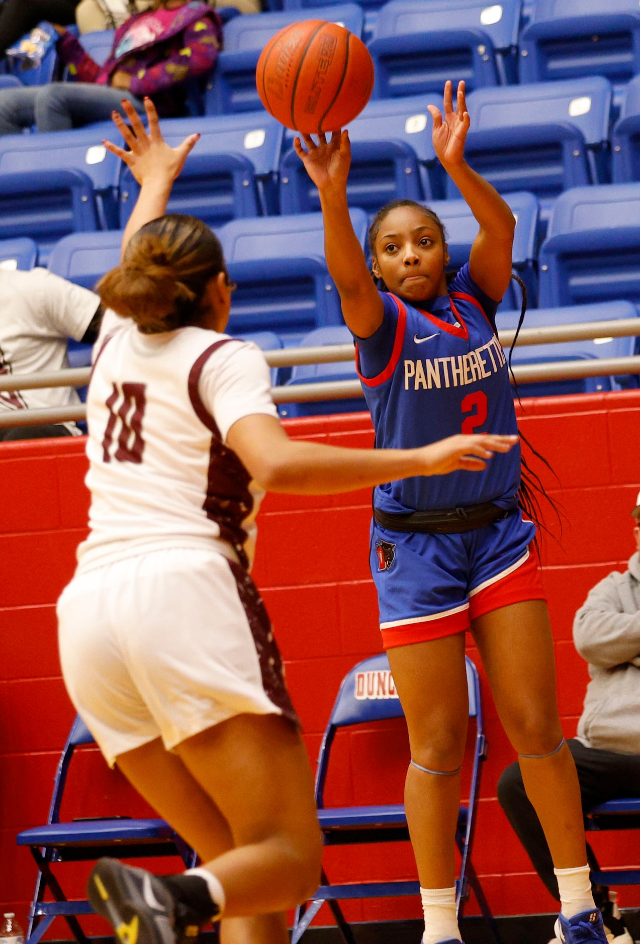 Duncanville's Aja Smith (2) shoots over Pearland's Brylee Bonner (10) during the first half...