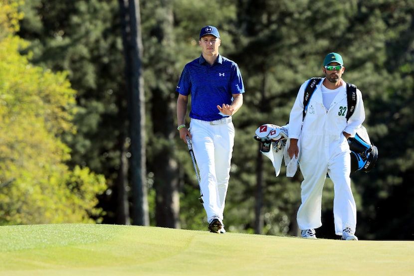 AUGUSTA, GA - APRIL 08:  Jordan Spieth of the United States reacts on the 18th hole...