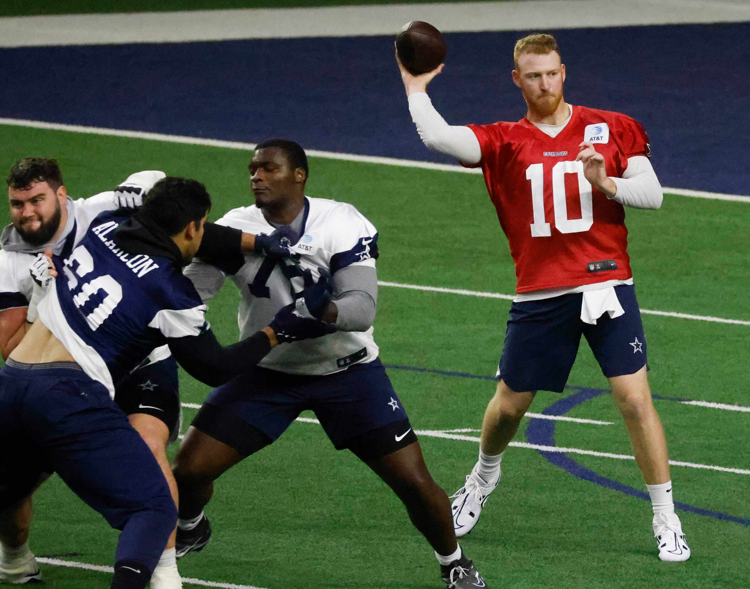 Dallas Cowboys quarterback Cooper Rush (10) throws during OTA practice on Thursday, June 1,...