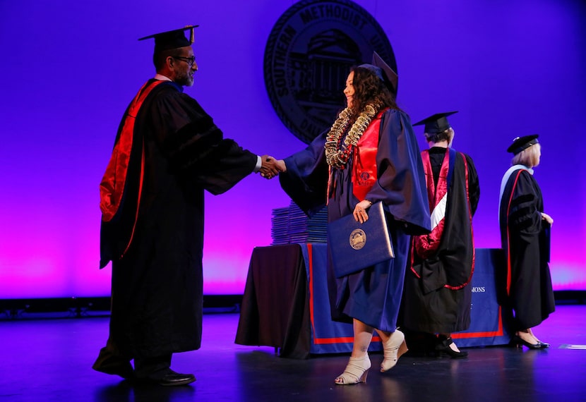 Wendy Birdsall walks across the stage at McFarlin Auditorium.