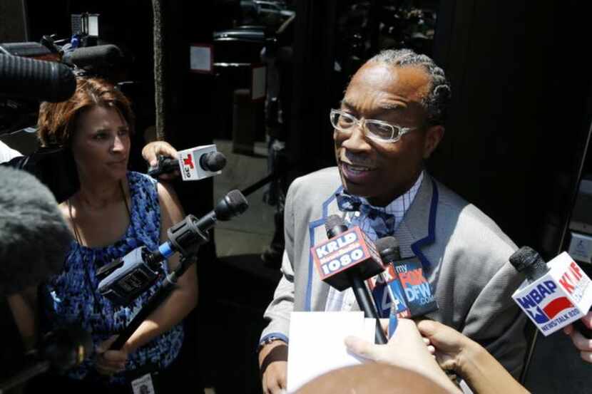 John Wiley Price says he is not guilty as he exits the Federal Building on Friday.