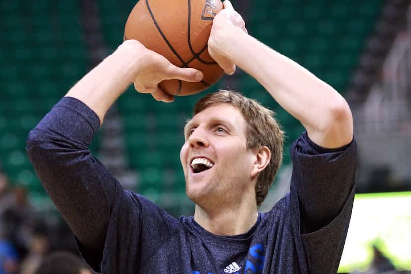 Dallas Mavericks' Dirk Nowitzki shoots the basketball during practice before the start of...