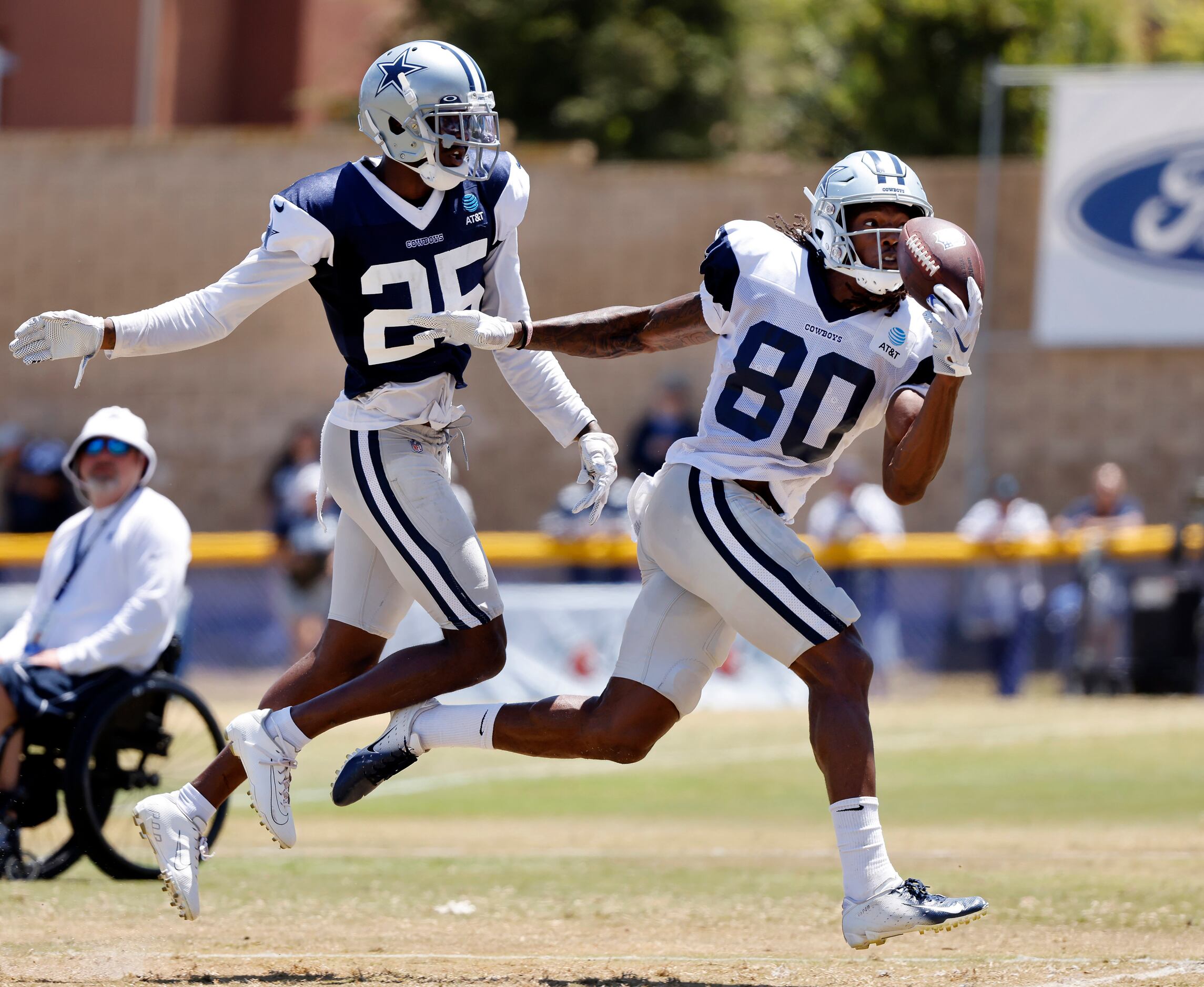 Dallas Cowboys wide receiver Brandon Smith (80) attempts a one-handed catch in the back of...