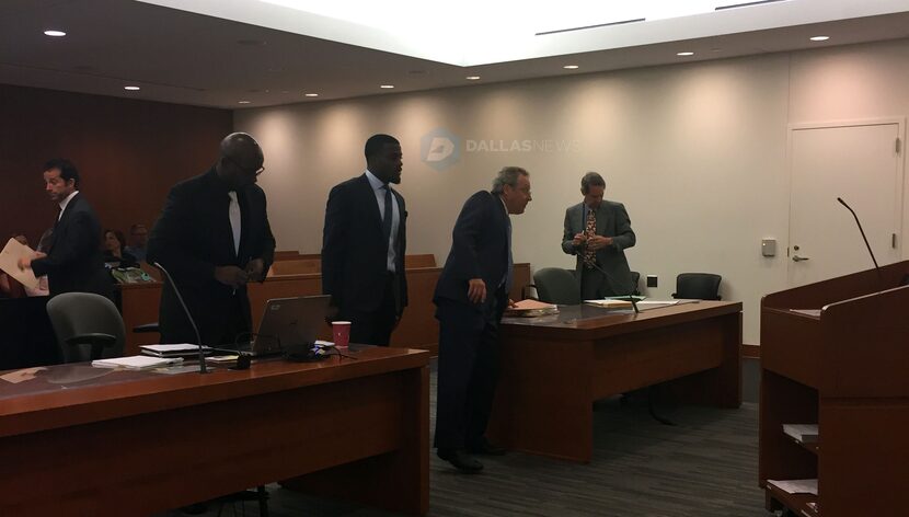 Cowboys rookie Jourdan Lewis (center) takes part in a Thursday settlement hearing connected...