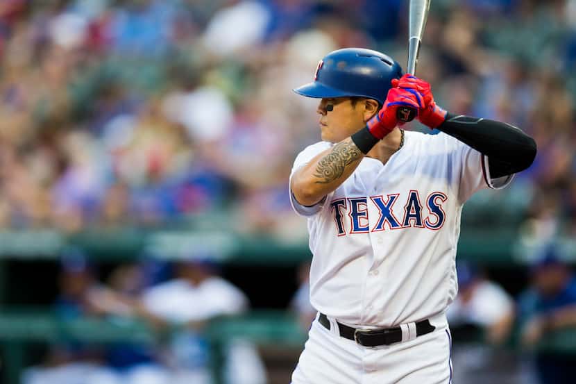 Texas Rangers right fielder Shin-Soo Choo (17) bats during the first inning of an MLB game...
