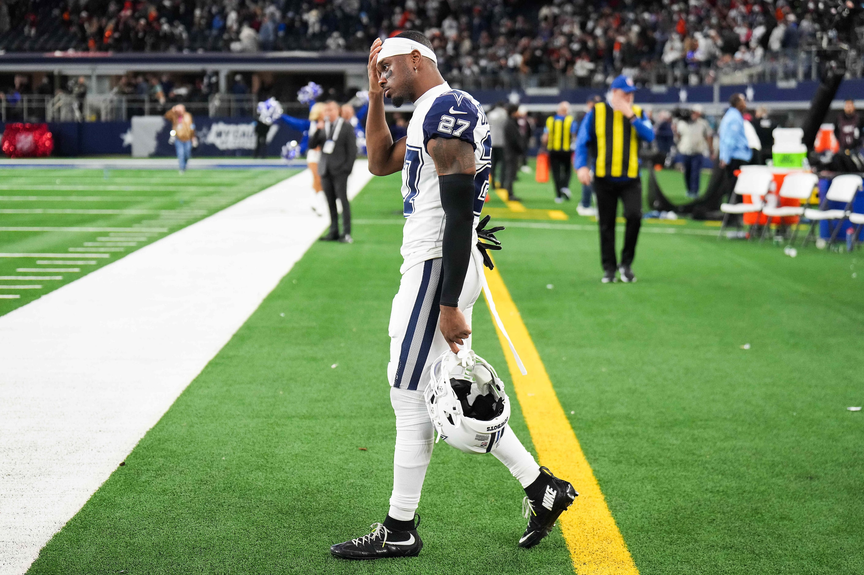 Dallas Cowboys cornerback Amani Oruwariye reacts on the sidelines after a loss to the...