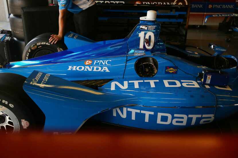 A mechanic works on the NTT Data Chip Ganassi Racing car #10 driven by Ed Jones before the...
