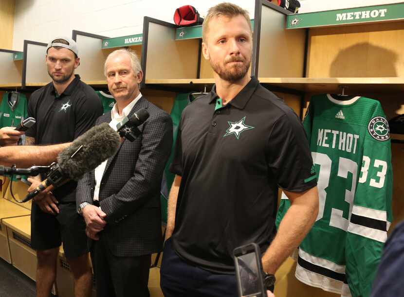 New Dallas Stars forward Martin Hanzal, left, and defenseman Marc Methot, right, talk with...