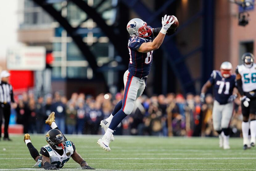 FOXBOROUGH, MA - JANUARY 21: Rob Gronkowski #87 of the New England Patriots catches a pass...