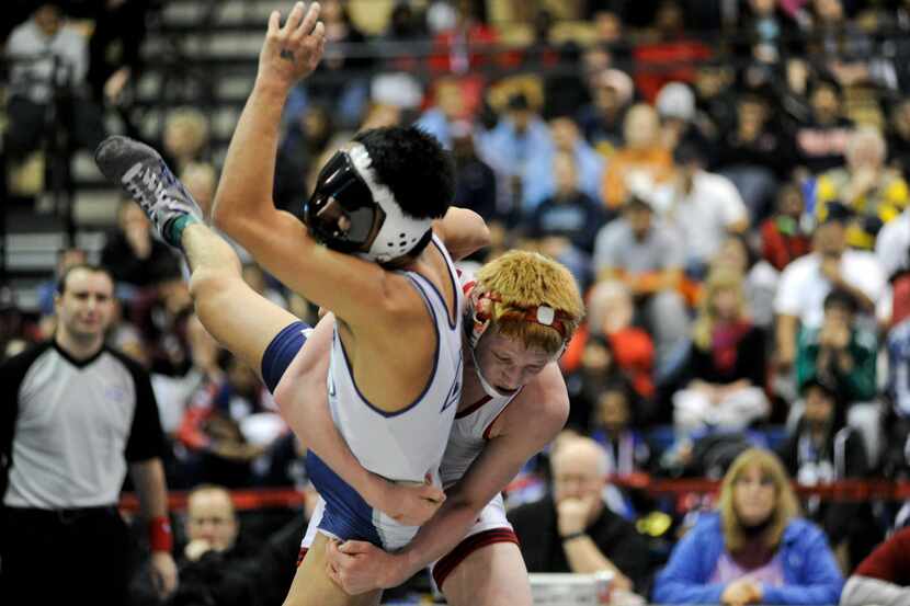 Allen's Bo Nickal takes down Flower Mound's Drake Dudley for the 160-pound weight class...