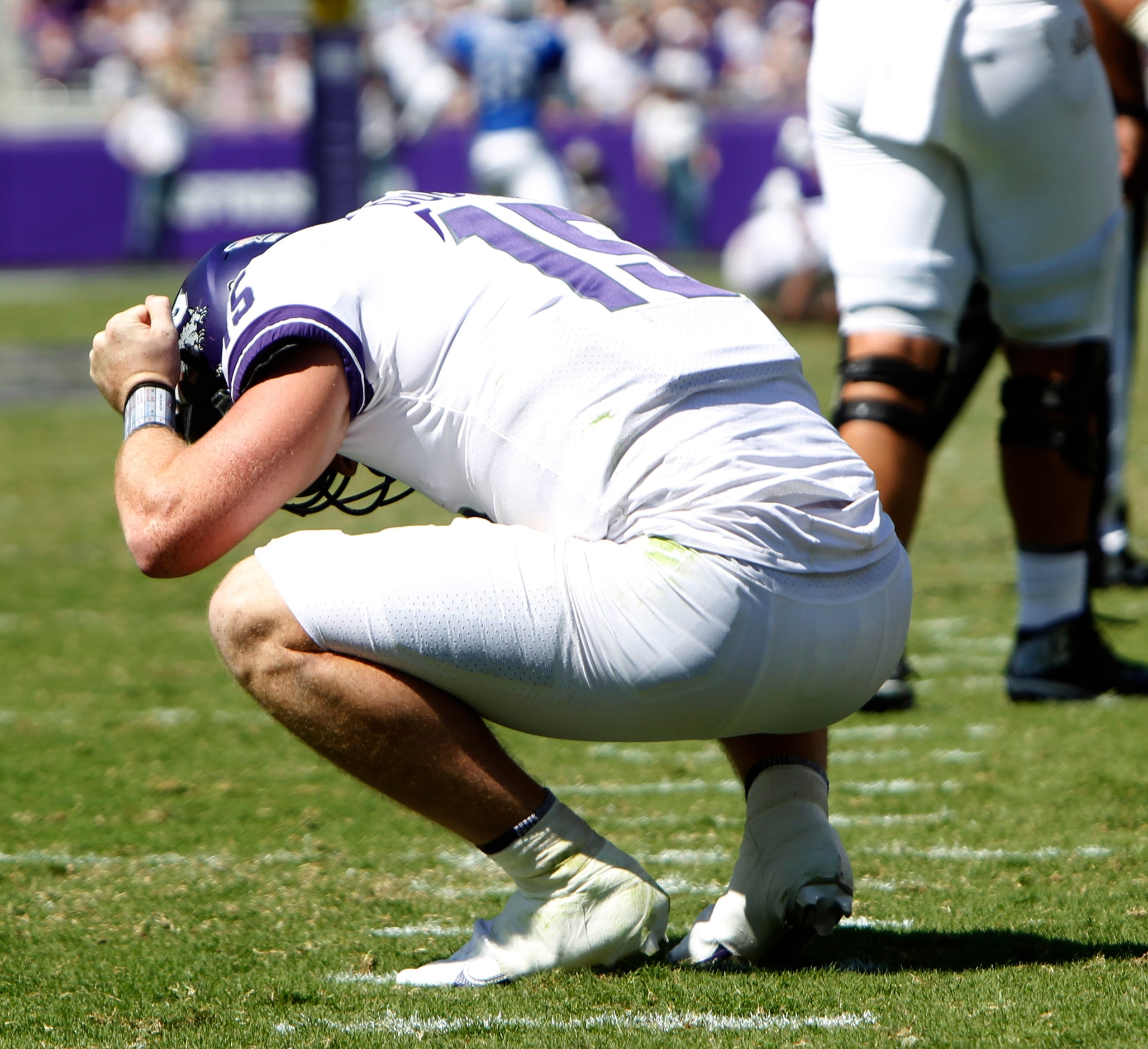 TCU quarterback Max Duggan (15) reacts after missing a long pass attempt during 4th quarter...