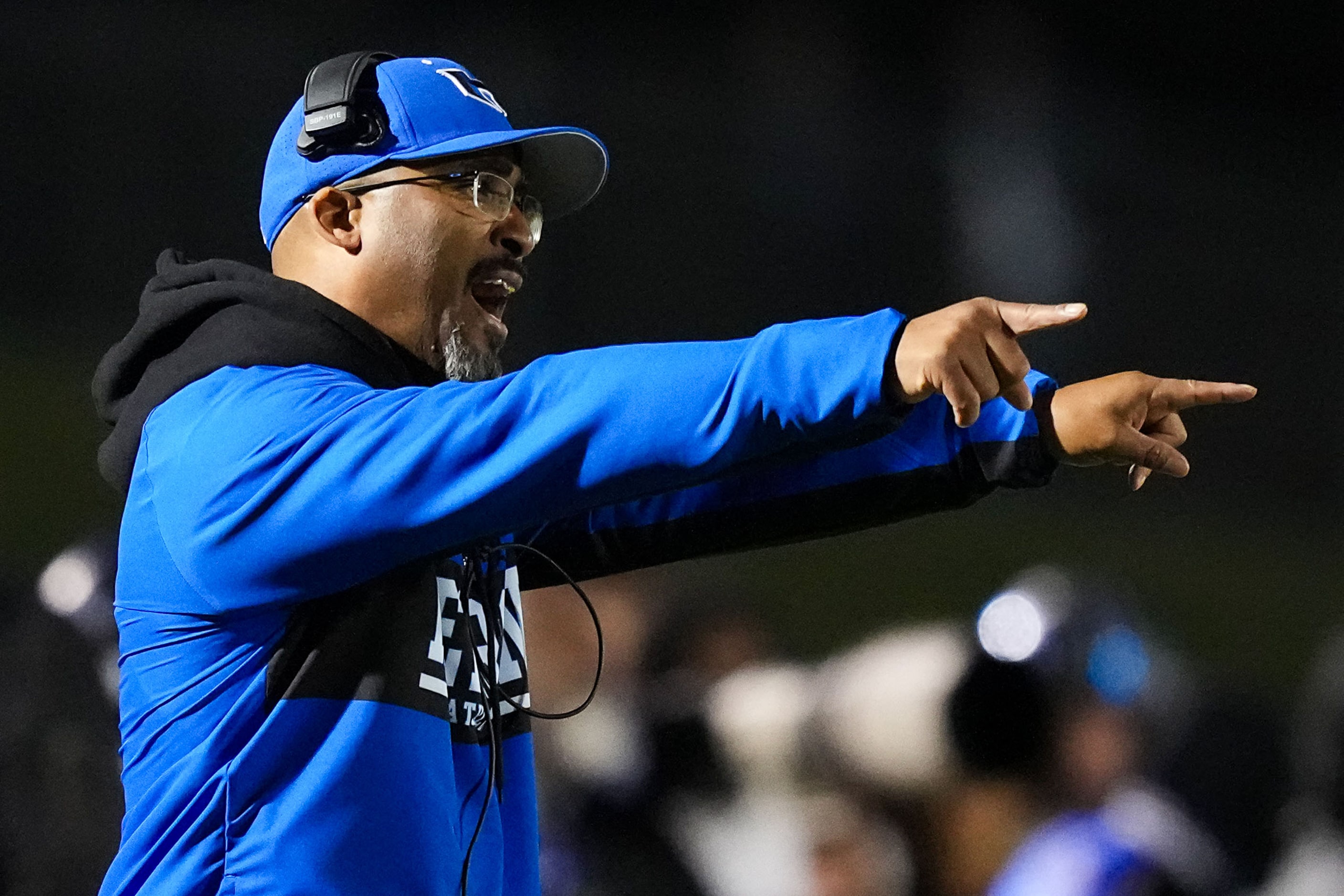 Hebron head coach John Towels works on the sidelines during the first half of a Class 6A...