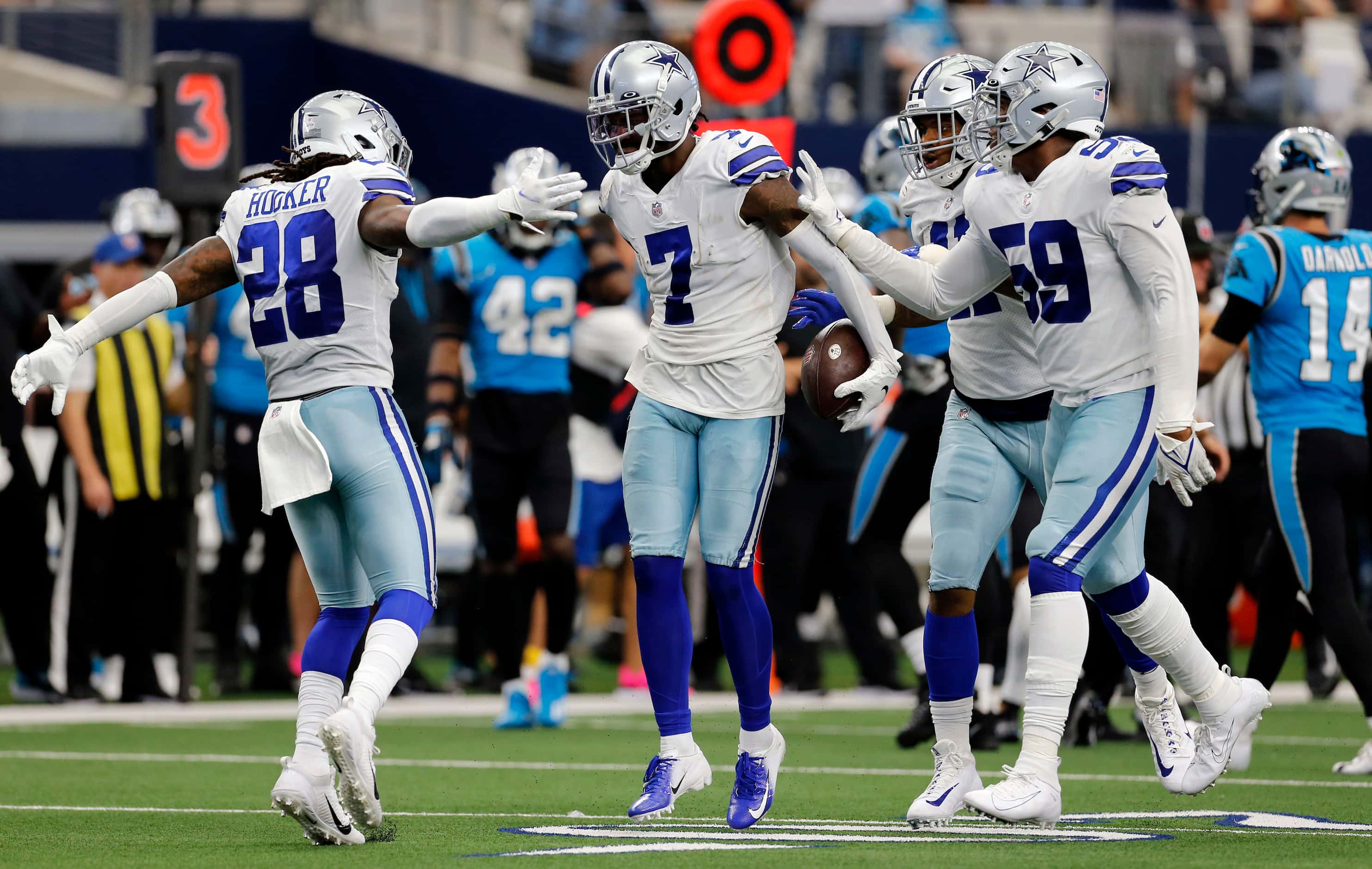 Dallas Cowboys cornerback Trevon Diggs (7) celebrates with teammates after making an...