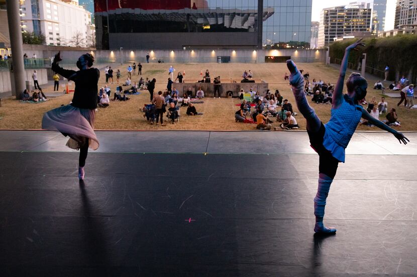 Dancers with the Avant Chamber Ballet warm up before performing at the Annette Strauss...