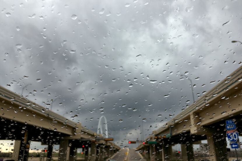 Light rain fell downtown as storms rolled through the area last March 11 near downtown Dallas.