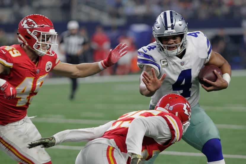 Slide 4:
Dallas quarterback DAK PRESCOTT threw two touchdown passes and added a rushing...