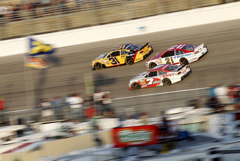 Sam Hornish Jr., driver of the (12) Alliance Trucks Parts  Ford,  leads early laps in the...