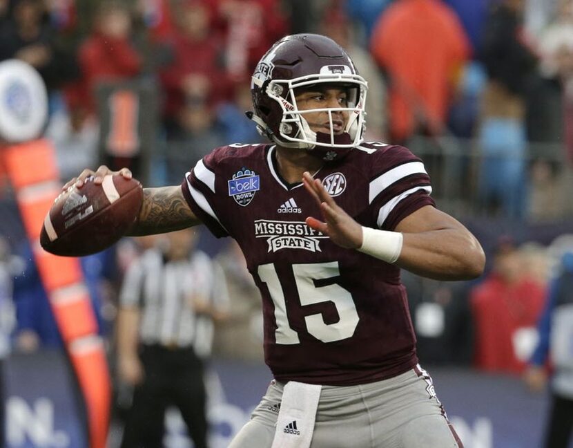 Mississippi State quarterback Dak Prescott (15) looks to pass against North Carolina State...