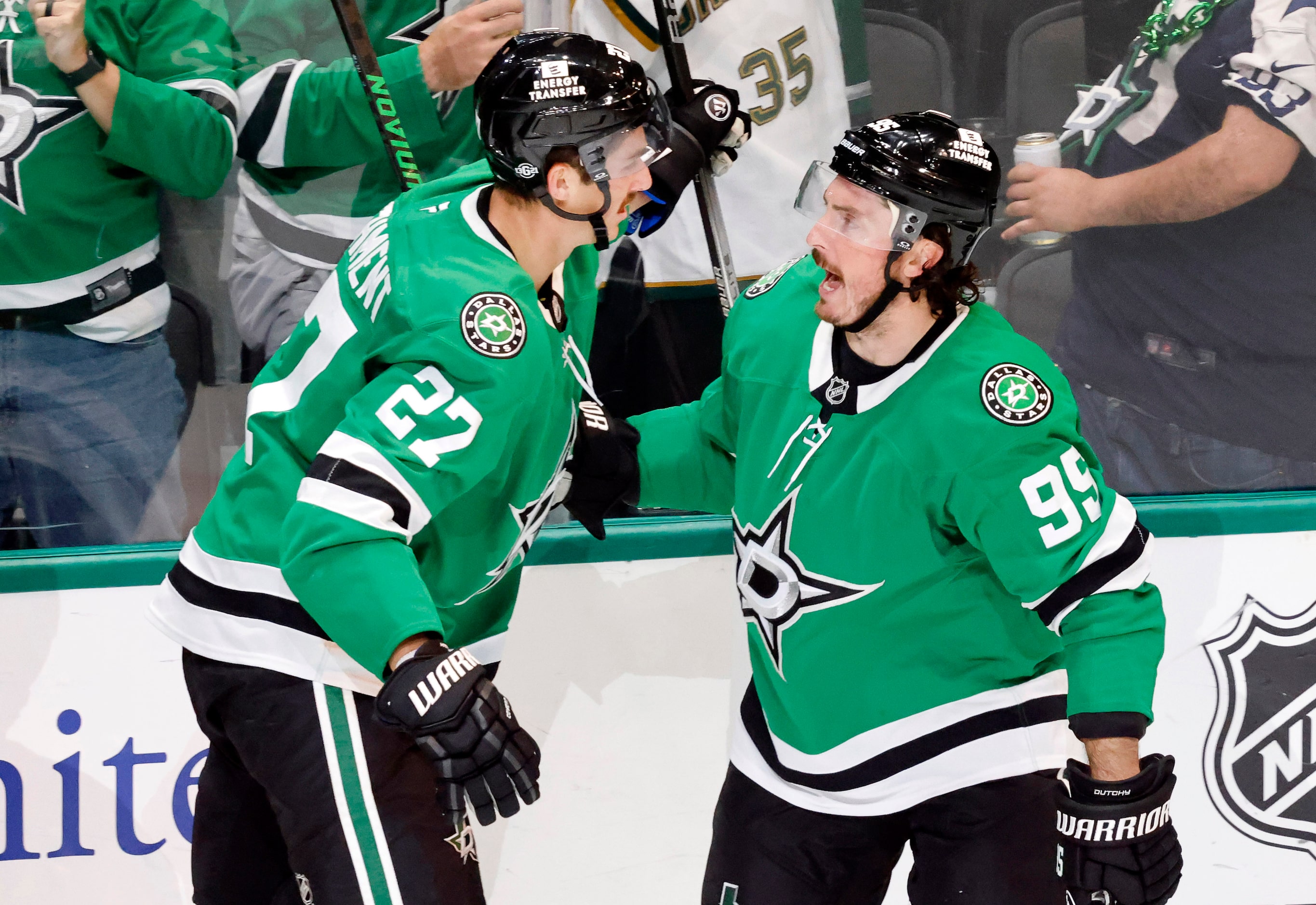 Dallas Stars left wing Mason Marchment (27) congratulates center Matt Duchene (95) on his...