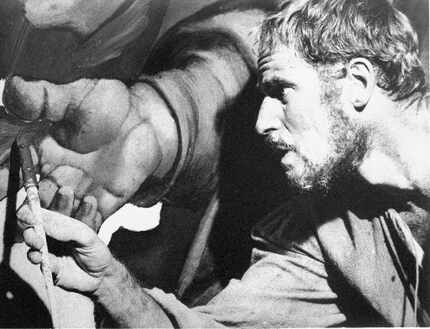 Michelangelo, played by Charlton Heston, is shown at work in a scene from the movie "The...