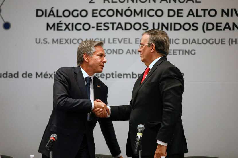 U.S. Secretary of State Antony Blinken and Mexico's Foreign Minister Marcelo Ebrard shake...