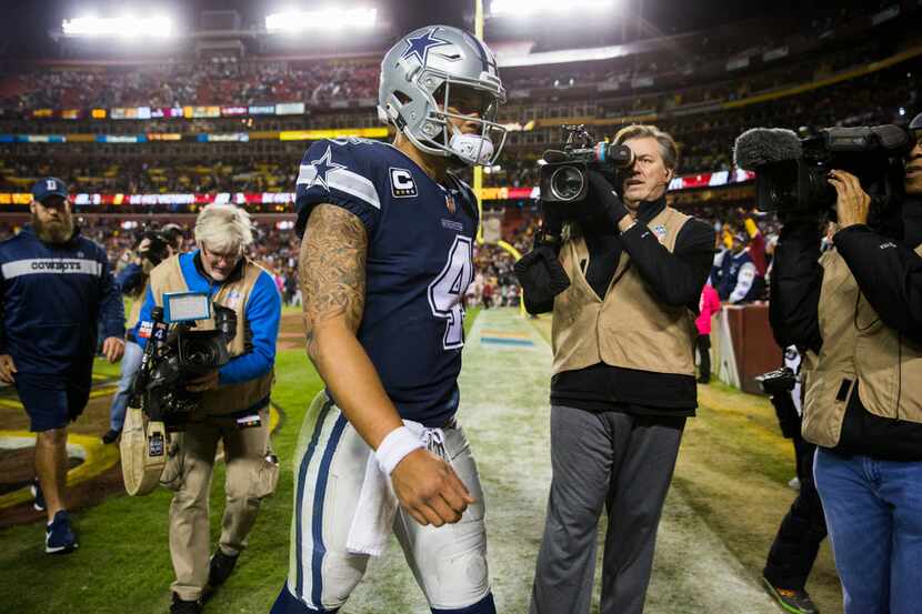 Dallas Cowboys quarterback Dak Prescott (4) leaves the stadium after the Dallas Cowboys lost...