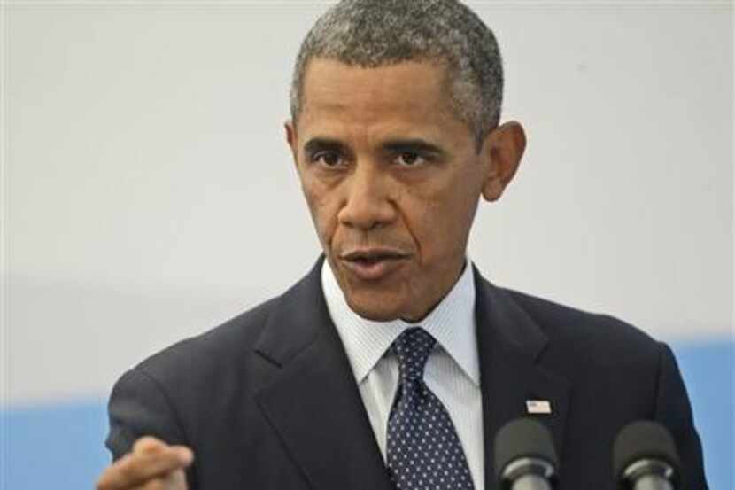 US President Barack Obama answers questions during his news conference at the G-20 Summit in...