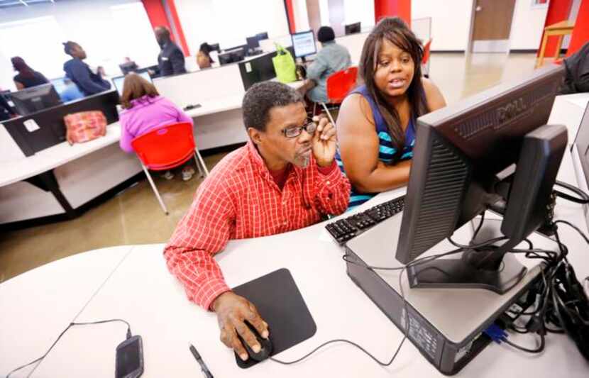 
Michael Beck and Leslie Garmon looked up jobs at the Workforce Solutions area, one of...