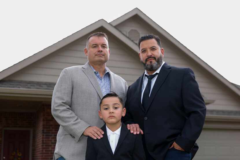Chad Pritchett (left) and Gary Garcia, shown with their adopted son, Alex Garcia-Pritchett, ...