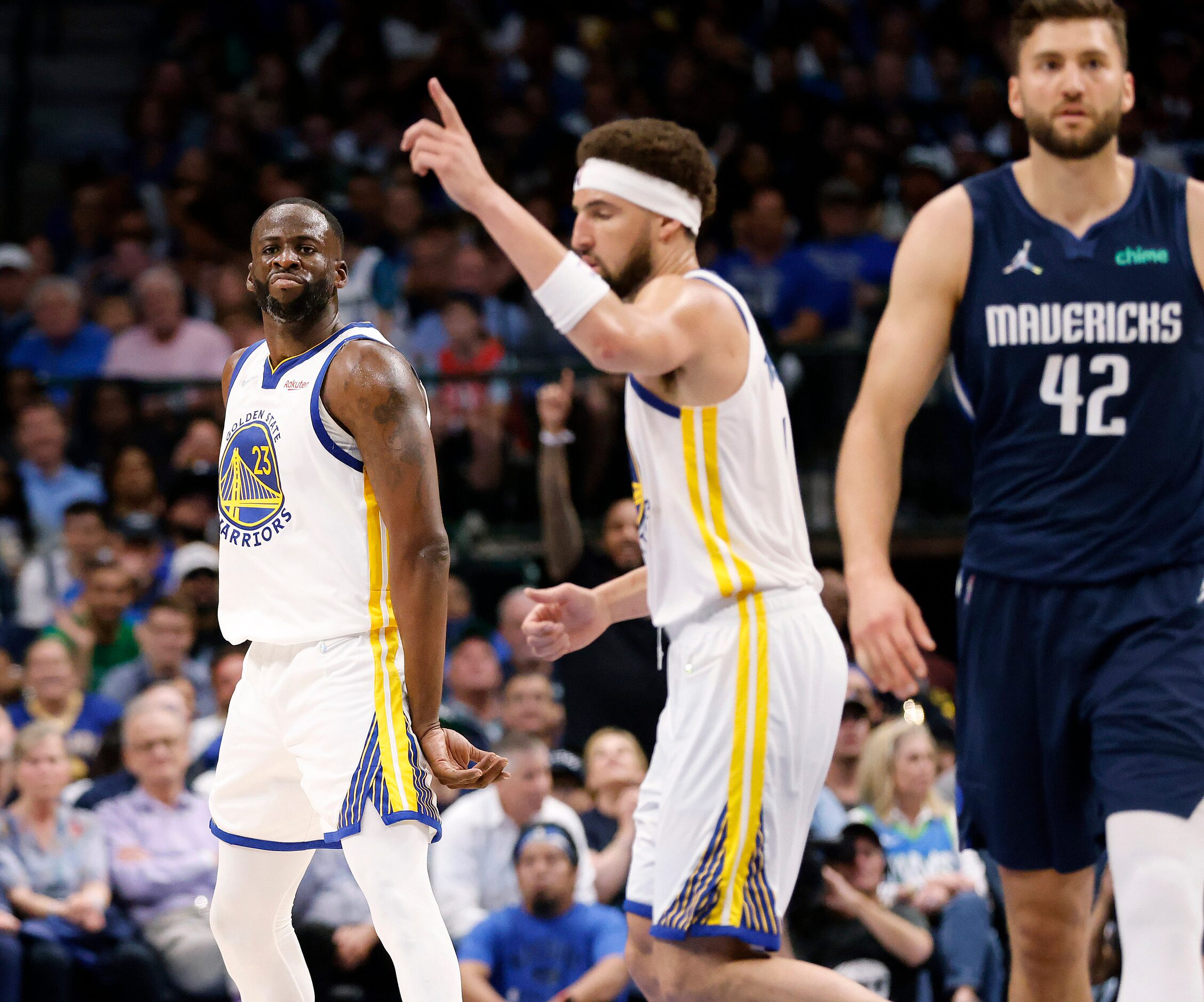 Golden State Warriors forward Draymond Green (23) reacts after hitting a second half...