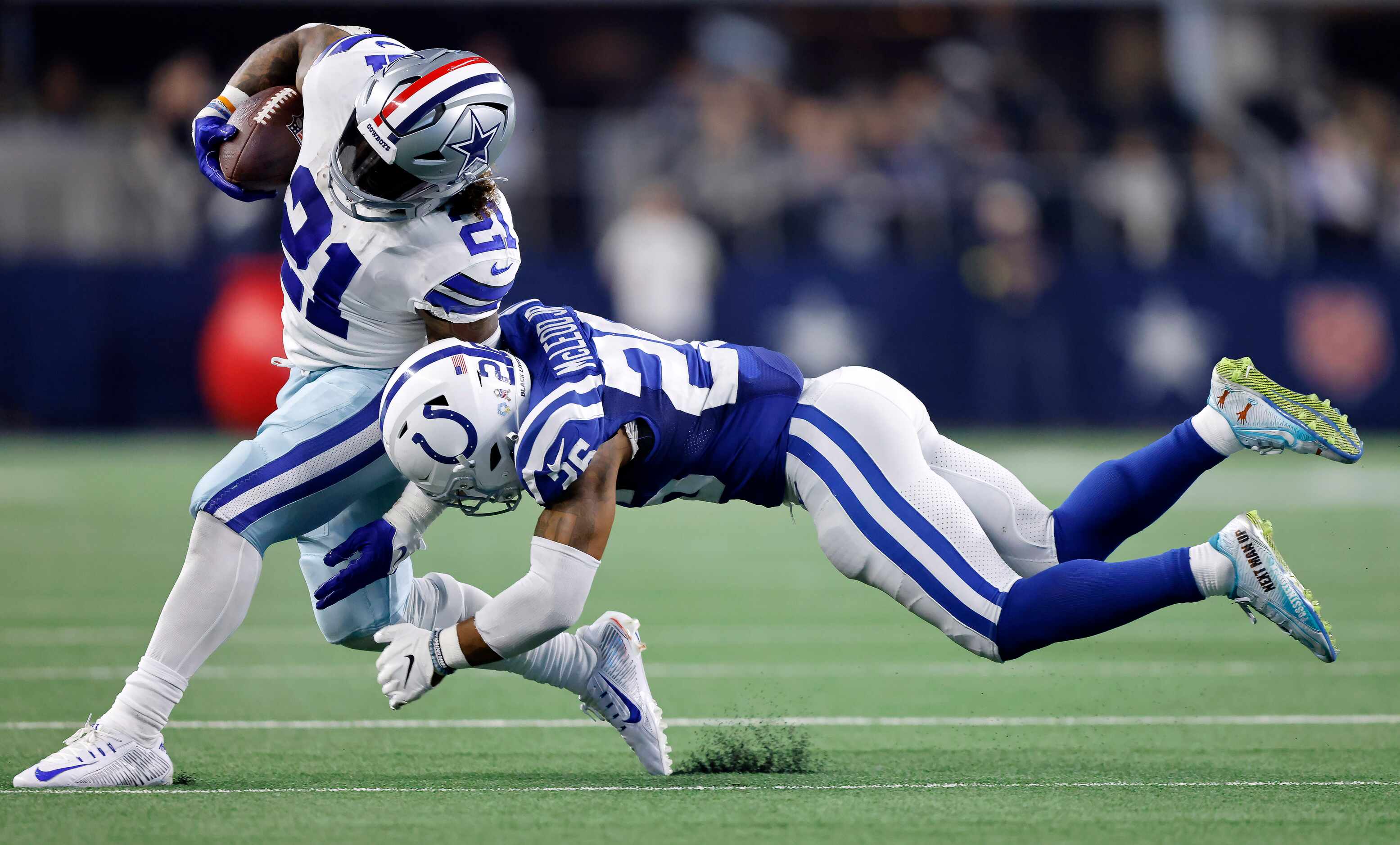 Indianapolis Colts safety Rodney McLeod (26) makes a diving tackle attempt of Dallas Cowboys...