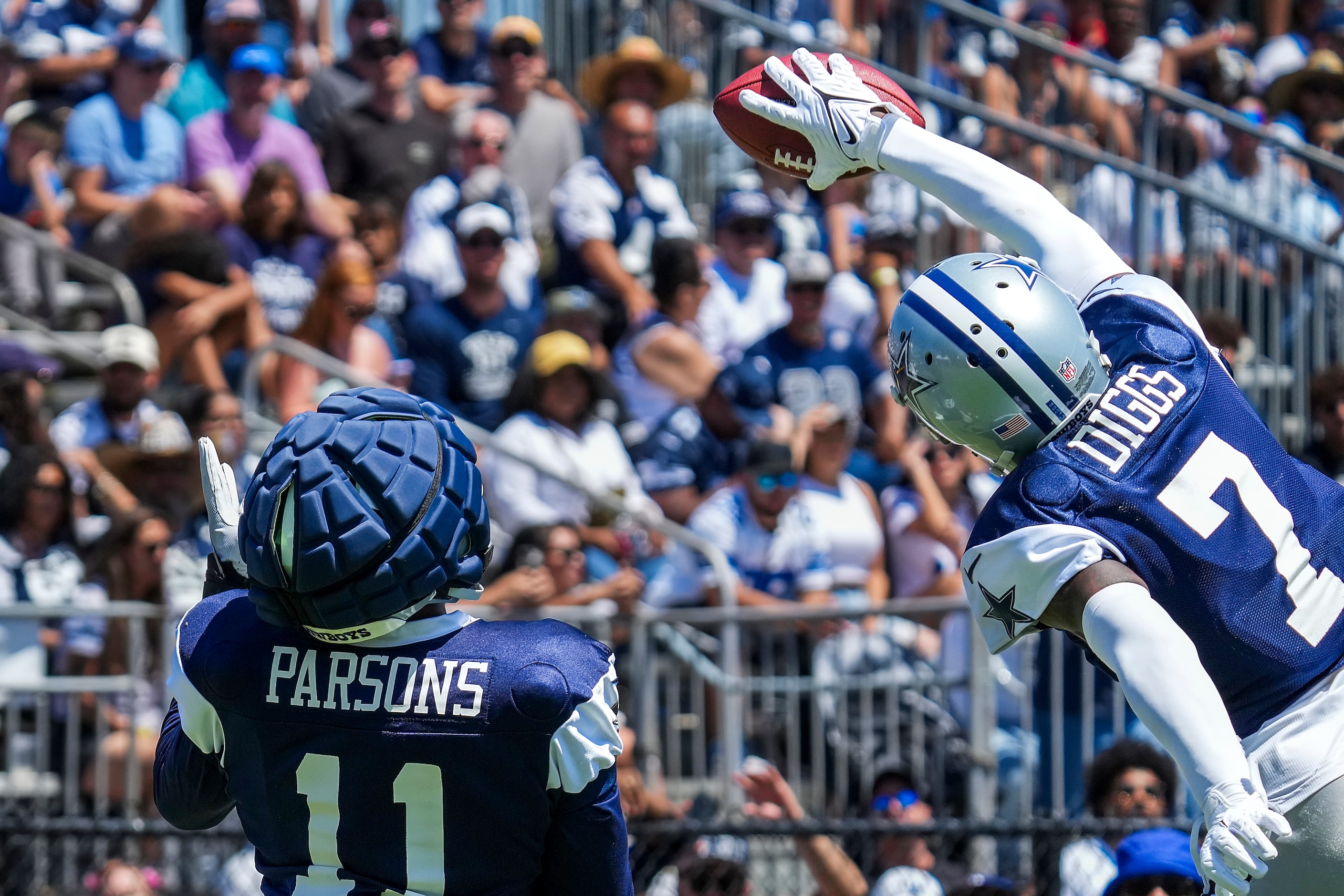 Dallas Cowboys cornerback Trevon Diggs (7) intercepts a ball thrown to linebacker Micah...