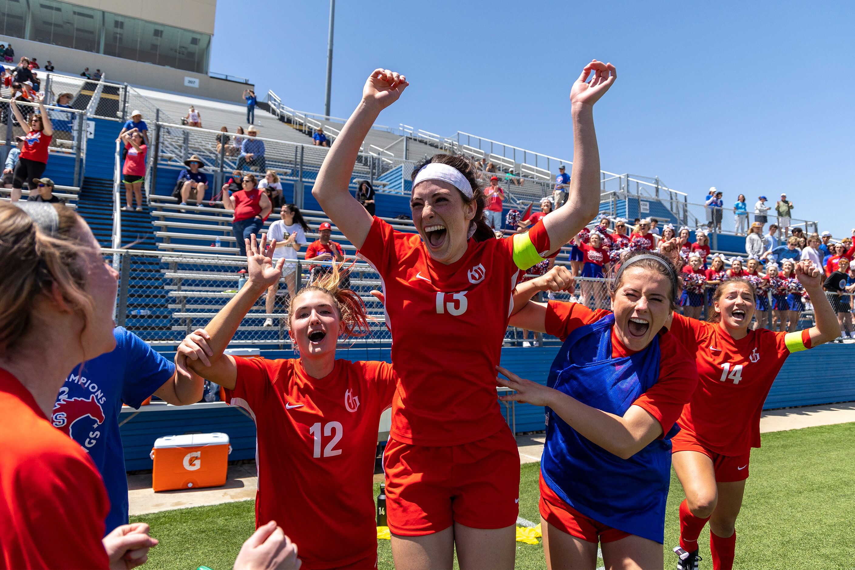 Grapevine forward Samantha Larsen (12) midfielder Kasten Merrill (13) forward Samantha...