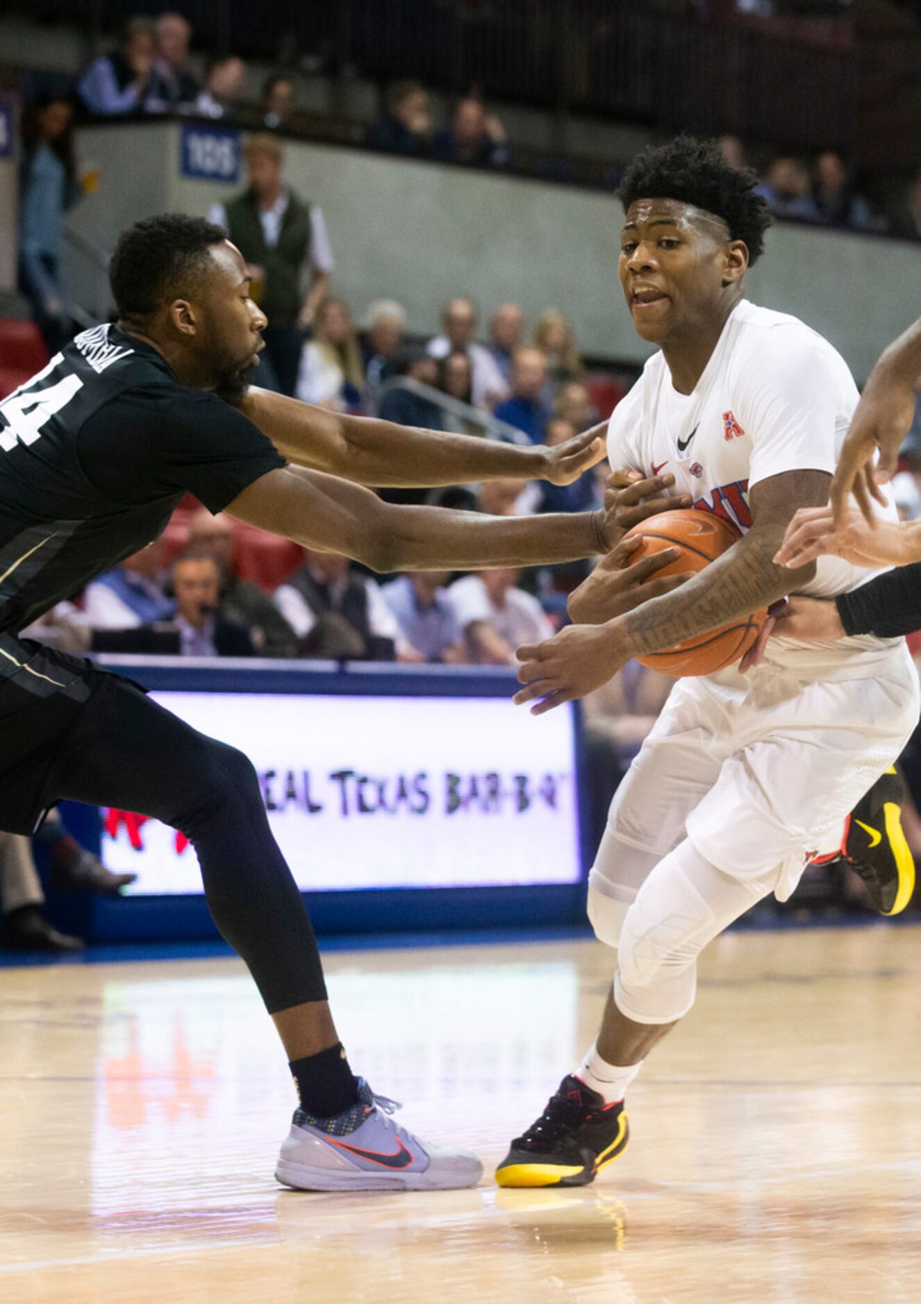 UCF Knights forward Ibrahim Famouke Doumbia (14) tries to steal the ball from Southern...