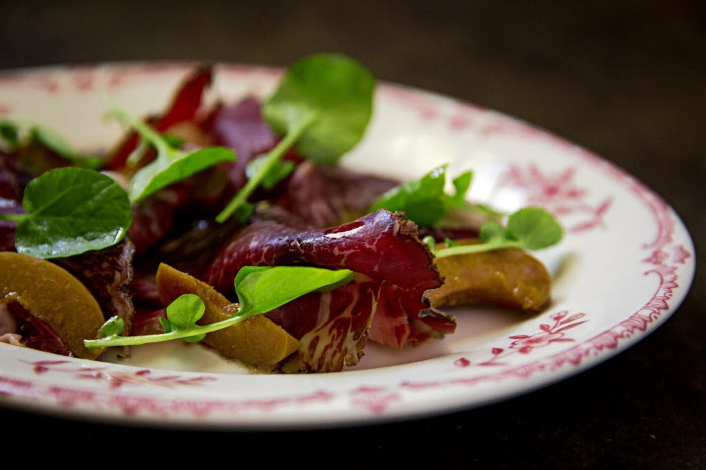 Wagyu basturma with pickled apricot and cress