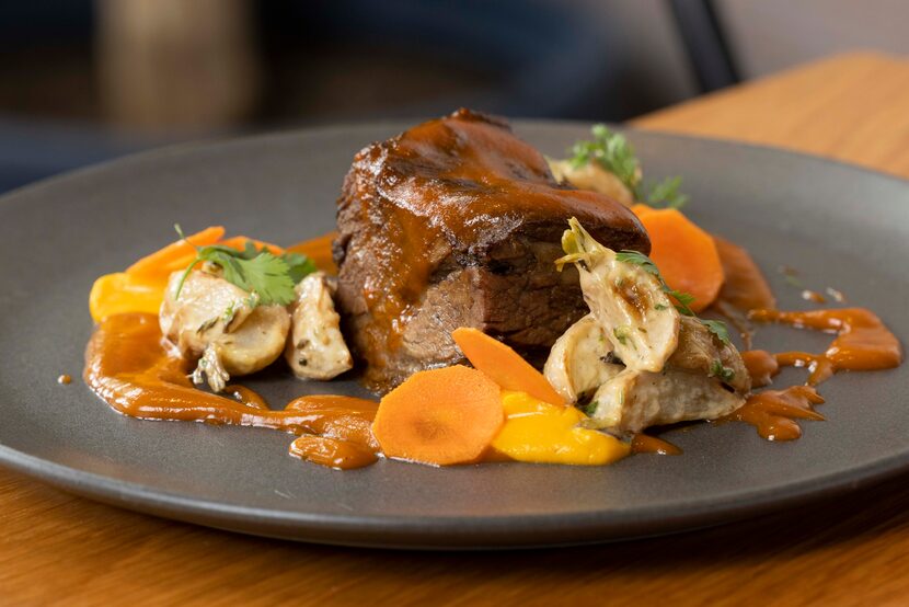 Short rib with peach “BBQ” carrot puree, warm turnip salad, and pickled carrot chips will be...