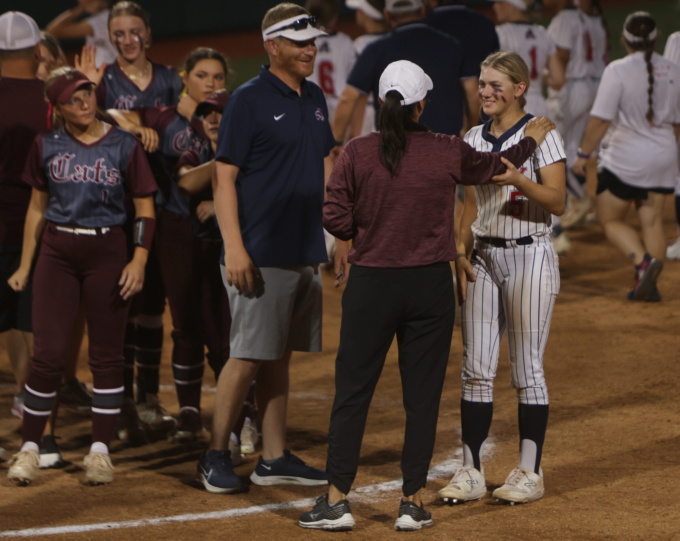 Aubrey's Keeli Fuller (5) speaks with concerned players and coaches from Corpus Christi...