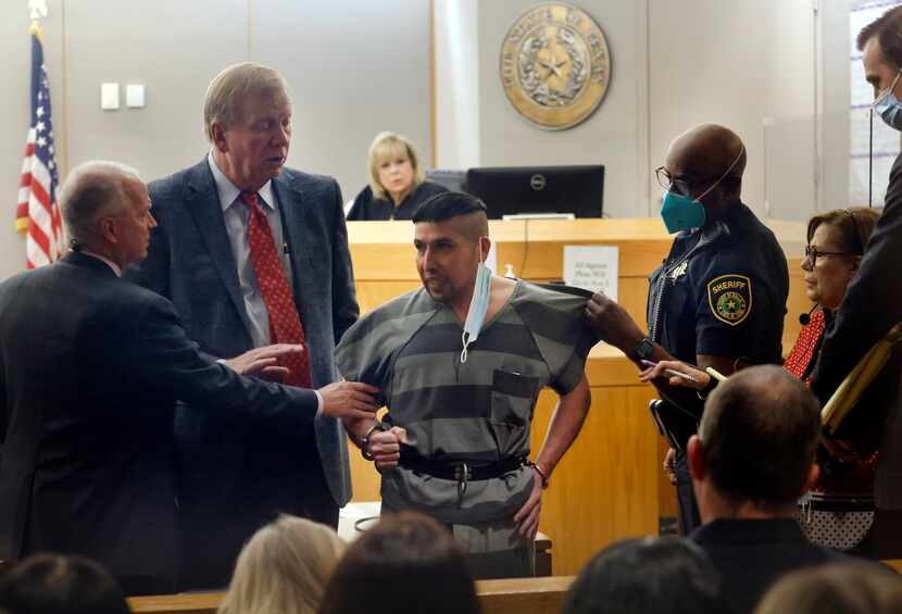 Convicted murderer Jaime Jaramillo was held back by a Dallas County deputy as he stepped...