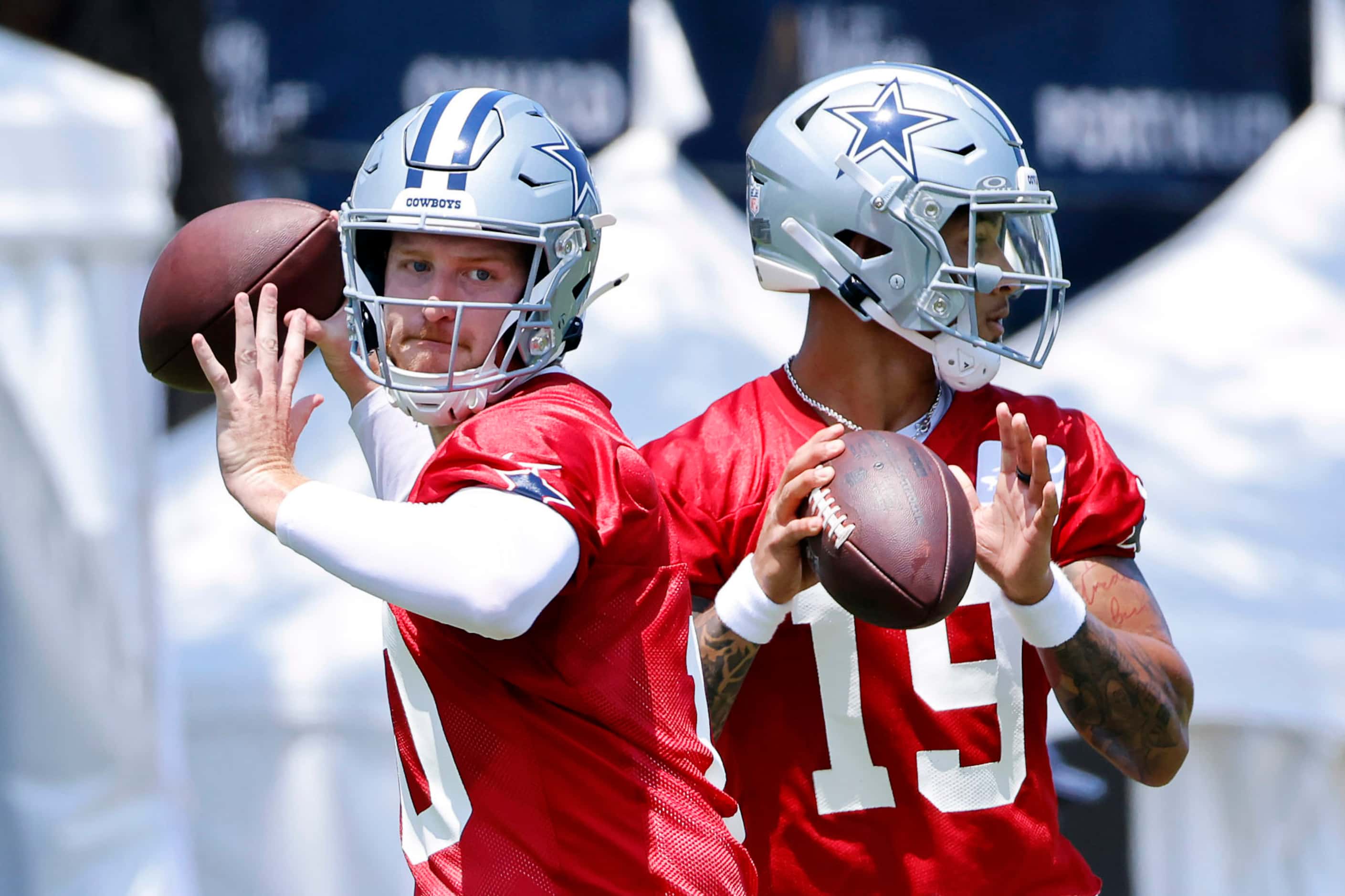 Dallas Cowboys quarterbacks Cooper Rush (10) and Trey Lance (19) throws to receivers during...