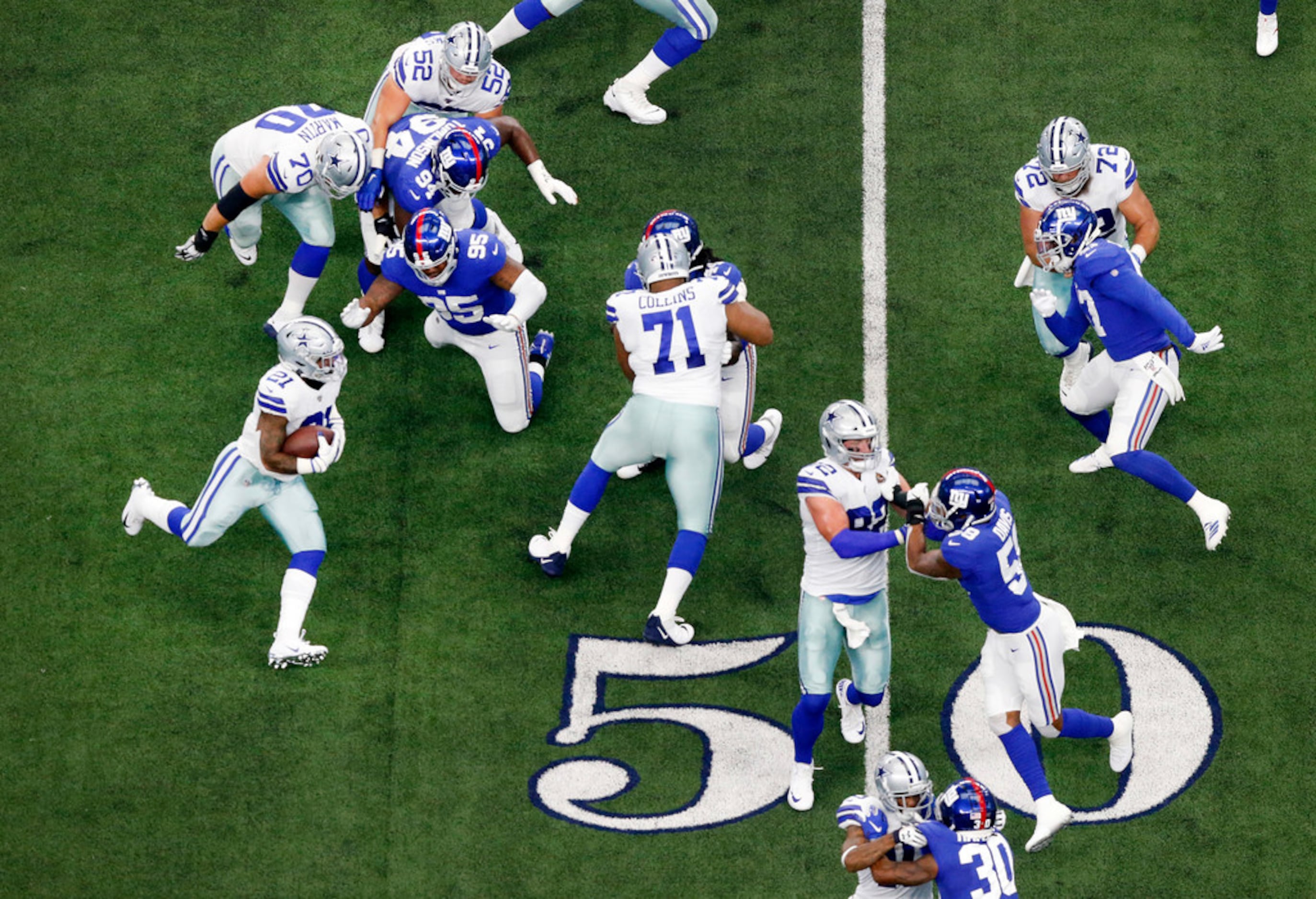 While Dak Prescott was perfect, the Cowboys' offensive line also received  top marks vs. Giants