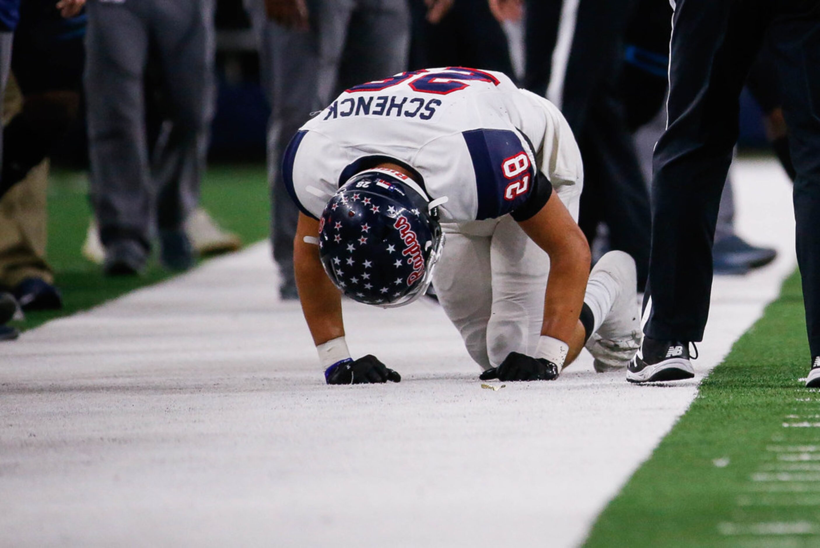 Denton Ryan's wide receiver Wesley Schenck (28) reacts to missing a catch in the first...