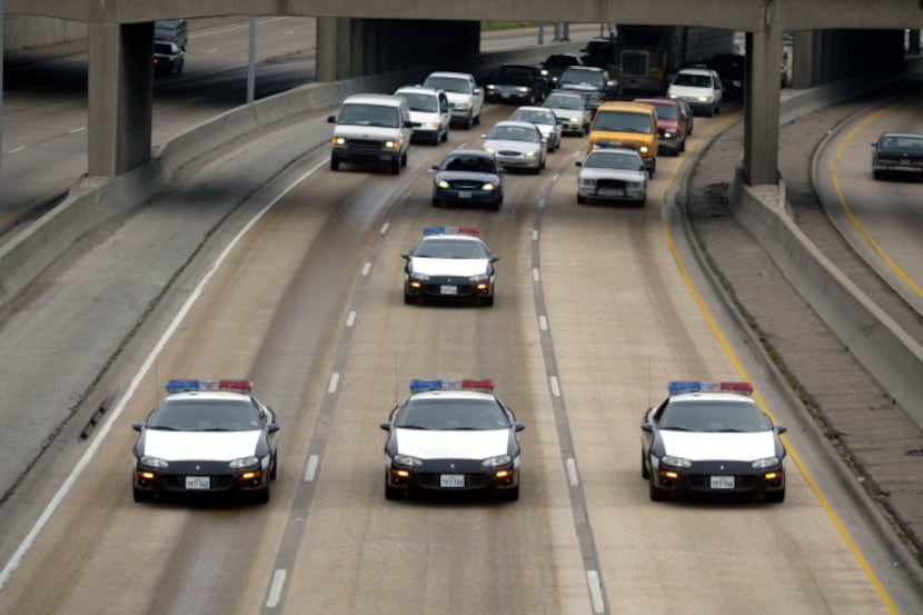 Dallas police used a “rolling roadblock” to slow speeders in the I-30 canyon near downtown...