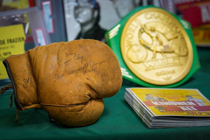1963 Cassius Clay (Muhammad Ali) signed and inscribed boxing glove and the WBC Heavyweight...