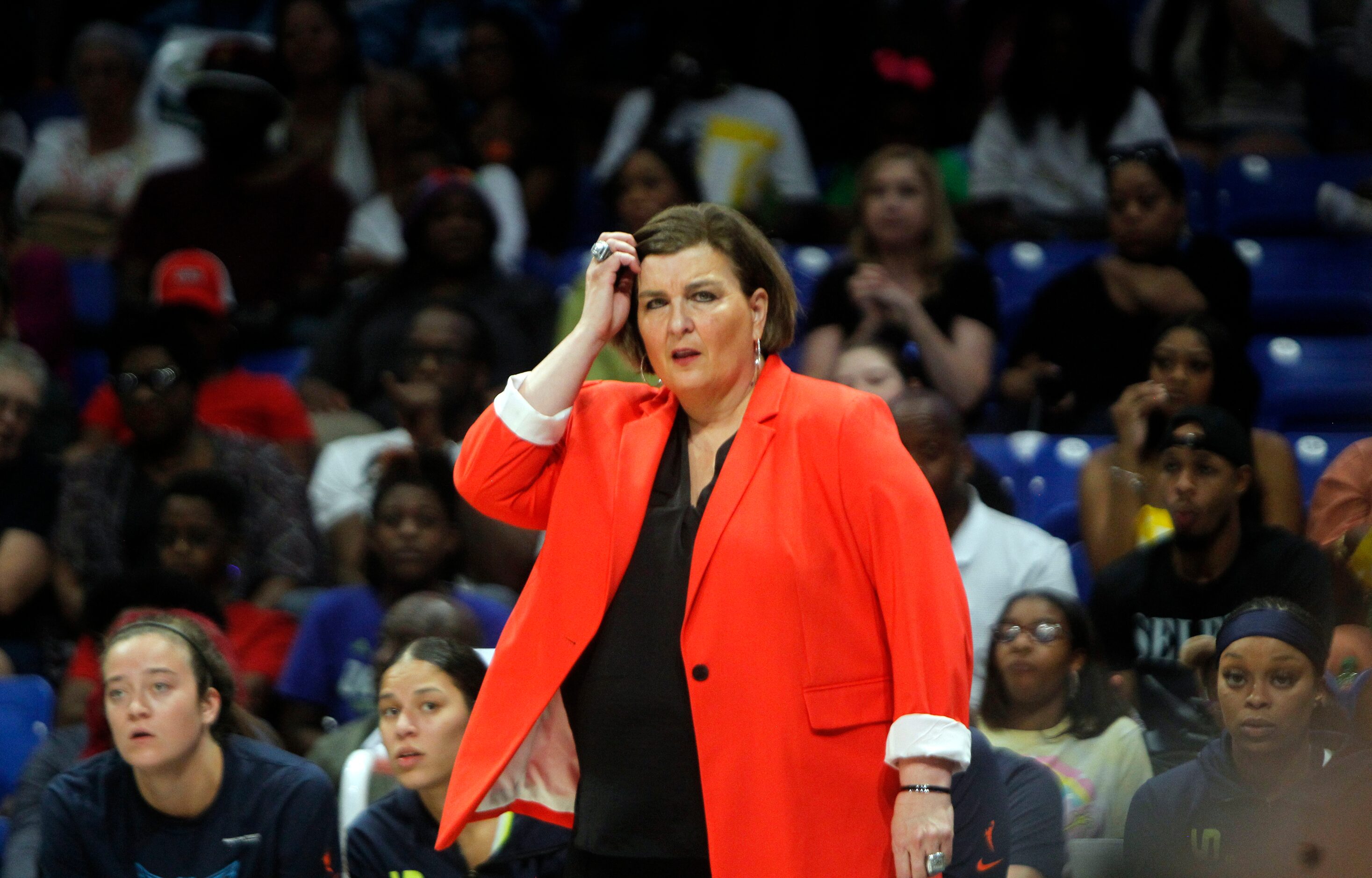 Dallas Wings head coach Latricia Trammell looks on from the team bench area during first...