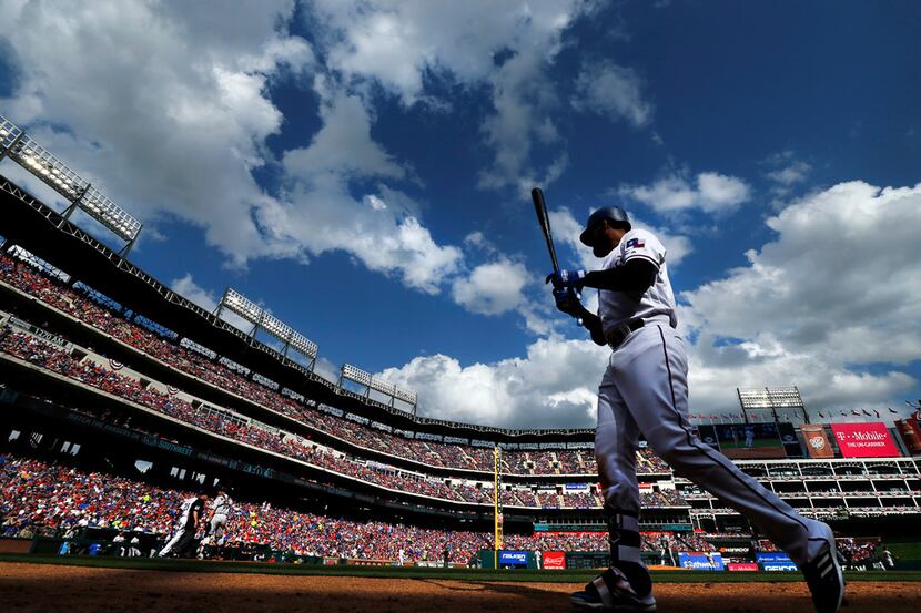 Texas Rangers center fielder Delino DeShields (3) walks to the batter circle against the...