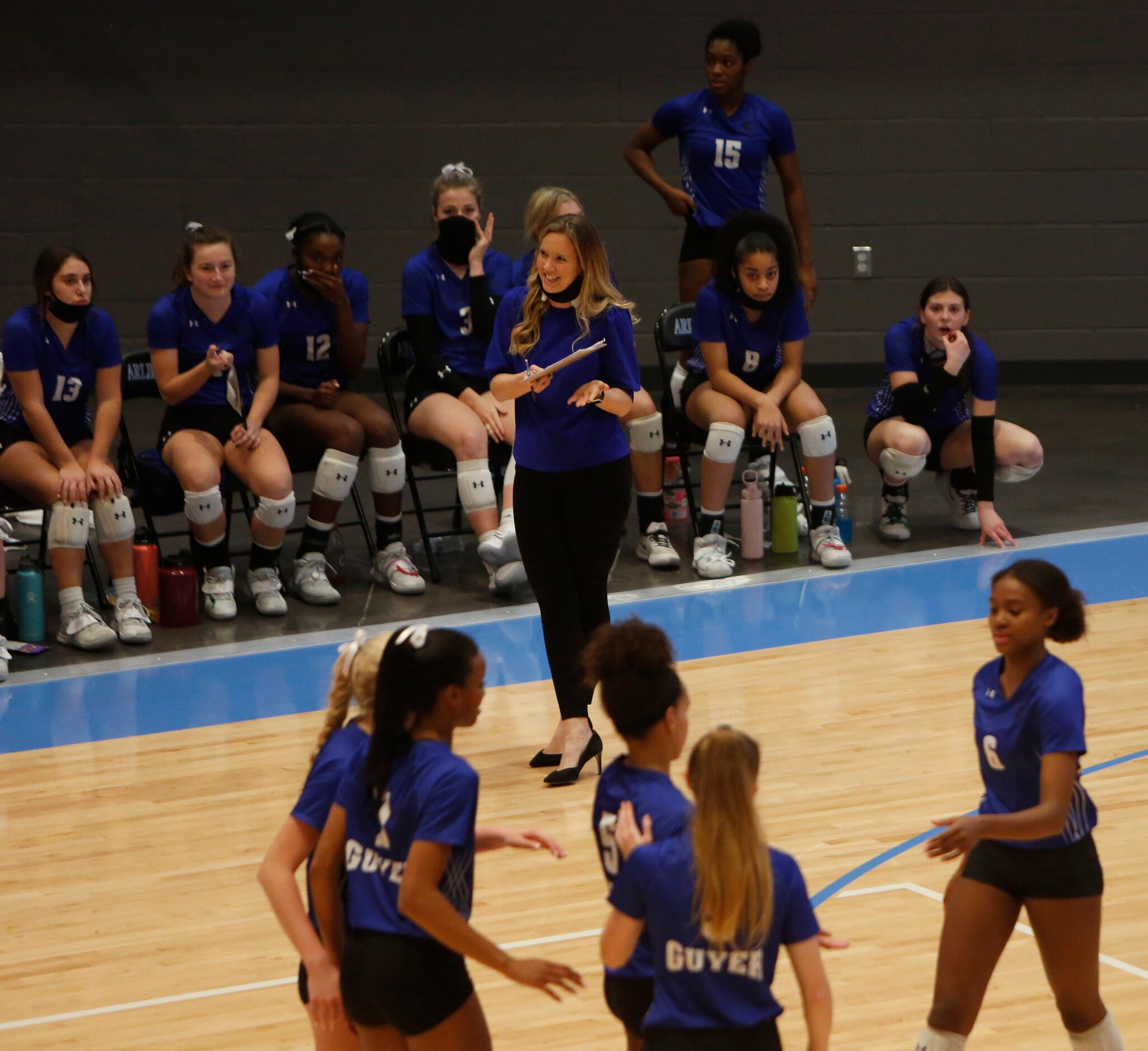 Denton Guyer head coach Heather Van Noy flashes her seal of approval following a successful...